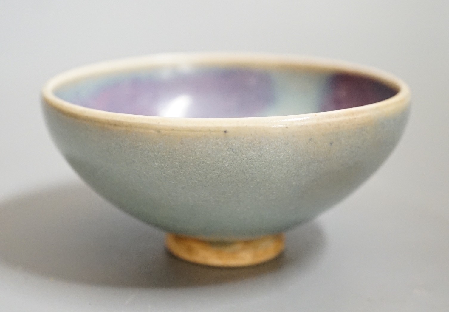 A Jun type purple splashed bowl, 9.5 cms diameter